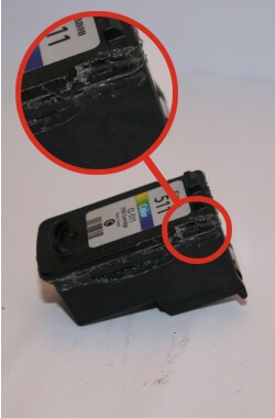 Tintenpatronen: #020/Canon CL-511 - Der Deckel wurde entfernt und wieder angeklebt.